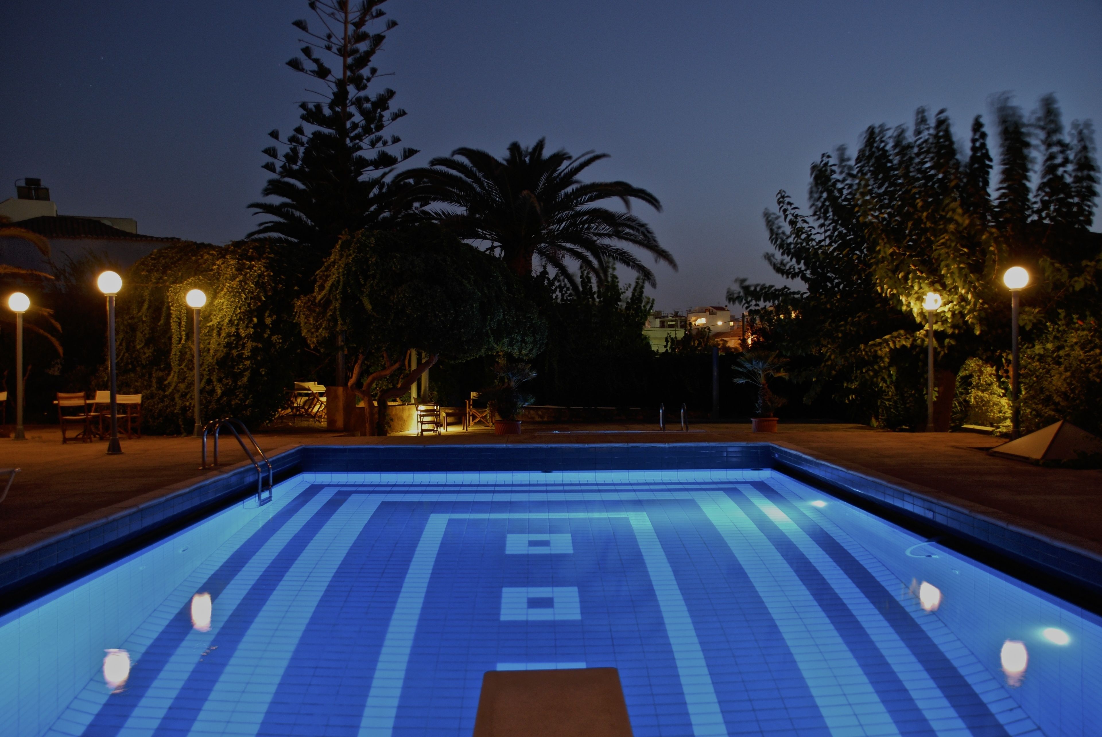 outdoor pool, pool umbrellas, pool loungers