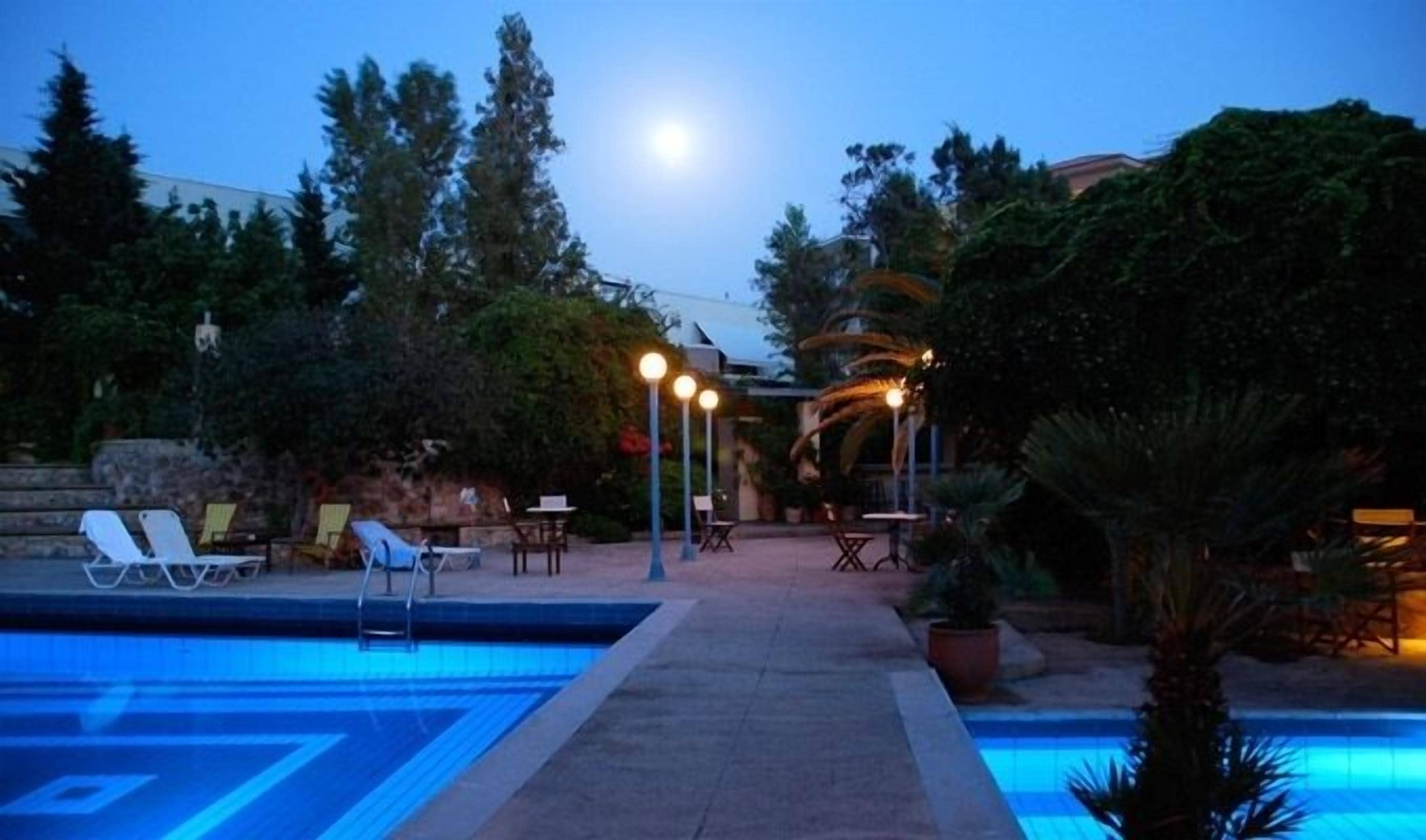 outdoor pool, pool umbrellas, pool loungers