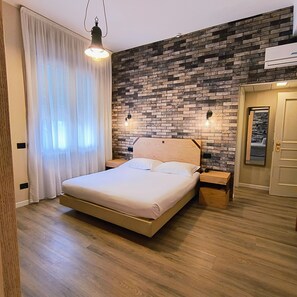 Suite | Minibar, in-room safe, desk, laptop workspace - Hotel Miramonti (Schio)