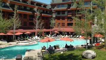 Outdoor pool, pool umbrellas, sun loungers