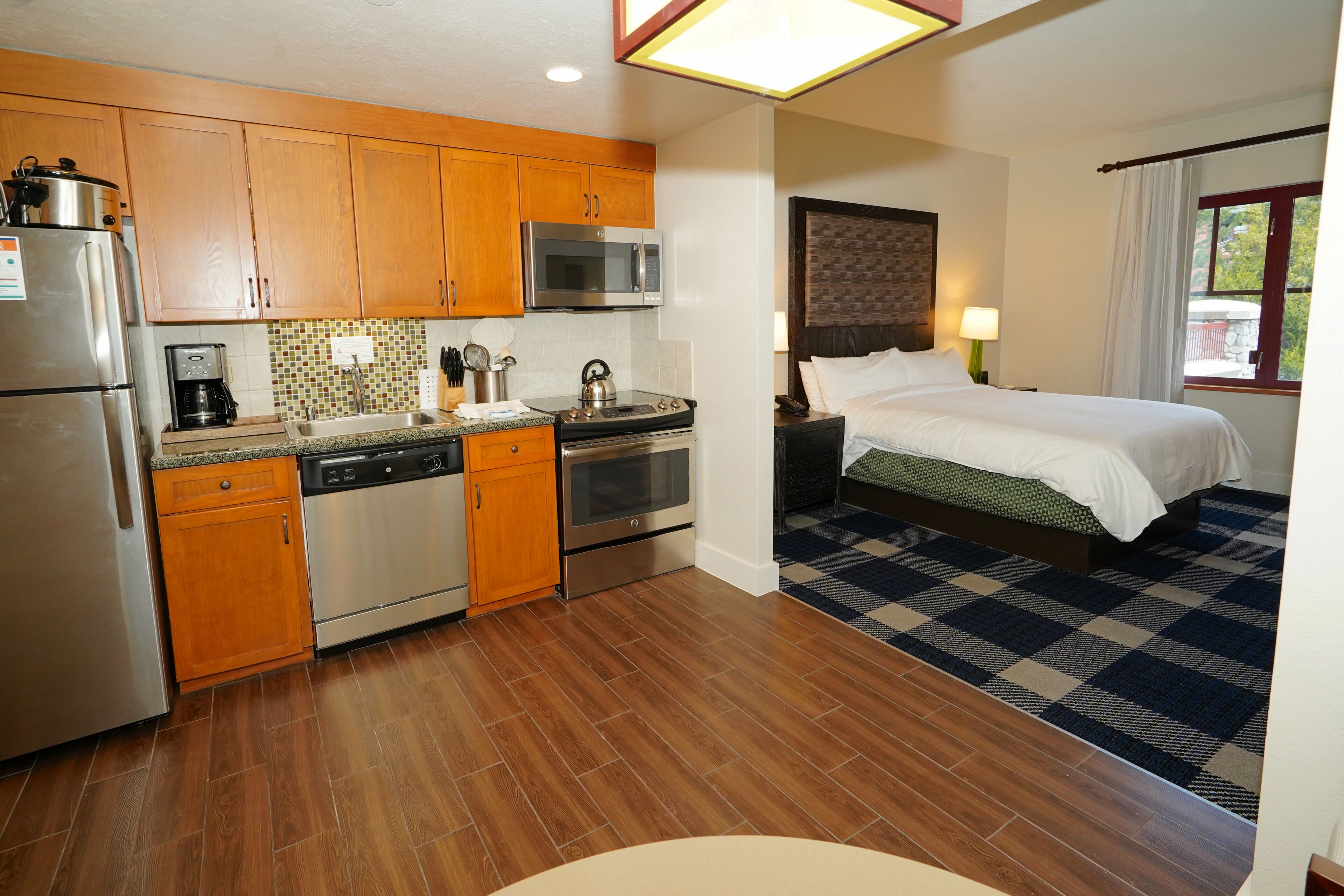 studio, kitchen | in-room safe, blackout curtains, iron/ironing board