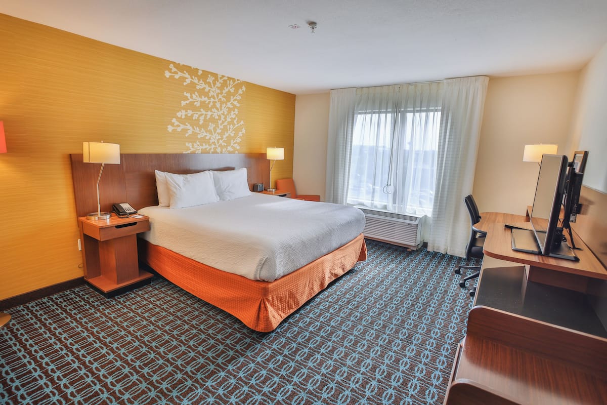 Habitación estándar, 1 cama King size | Caja de seguridad en la habitación y escritorio