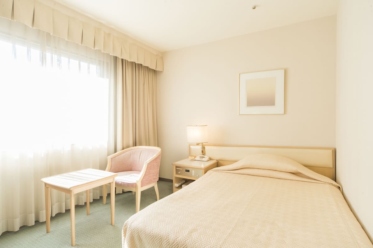 Couette en duvet d'oie, coffres-forts dans les chambres, bureau