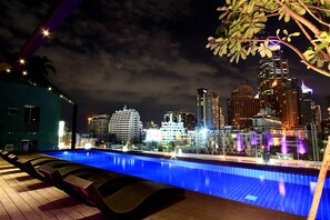 Outdoor pool, open 7:00 AM to 8:00 PM, pool umbrellas, pool loungers