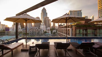 Outdoor pool, open 7:00 AM to 8:00 PM, pool umbrellas, sun loungers