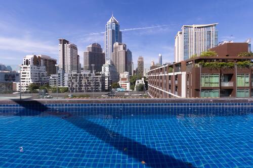 Outdoor pool, open 7:00 AM to 8:00 PM, pool umbrellas, pool loungers