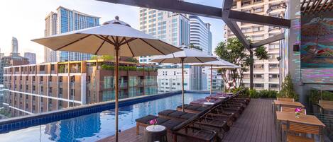 Outdoor pool, open 7:00 AM to 8:00 PM, pool umbrellas, sun loungers