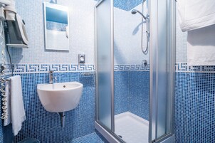 Free toiletries, hair dryer, slippers, bidet