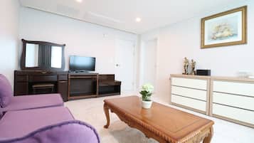 38-inch flat-screen TV with cable channels, TV