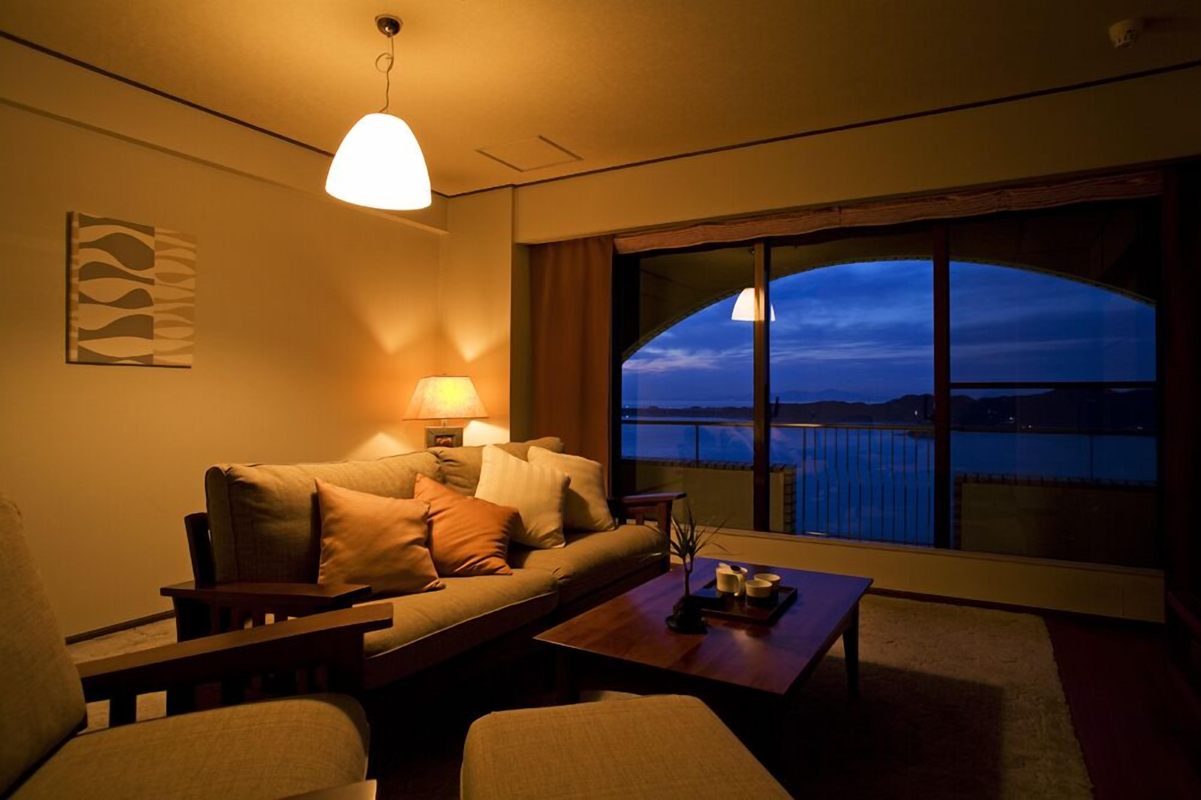 suite, smoking (no.711) | living area | flat-screen tv