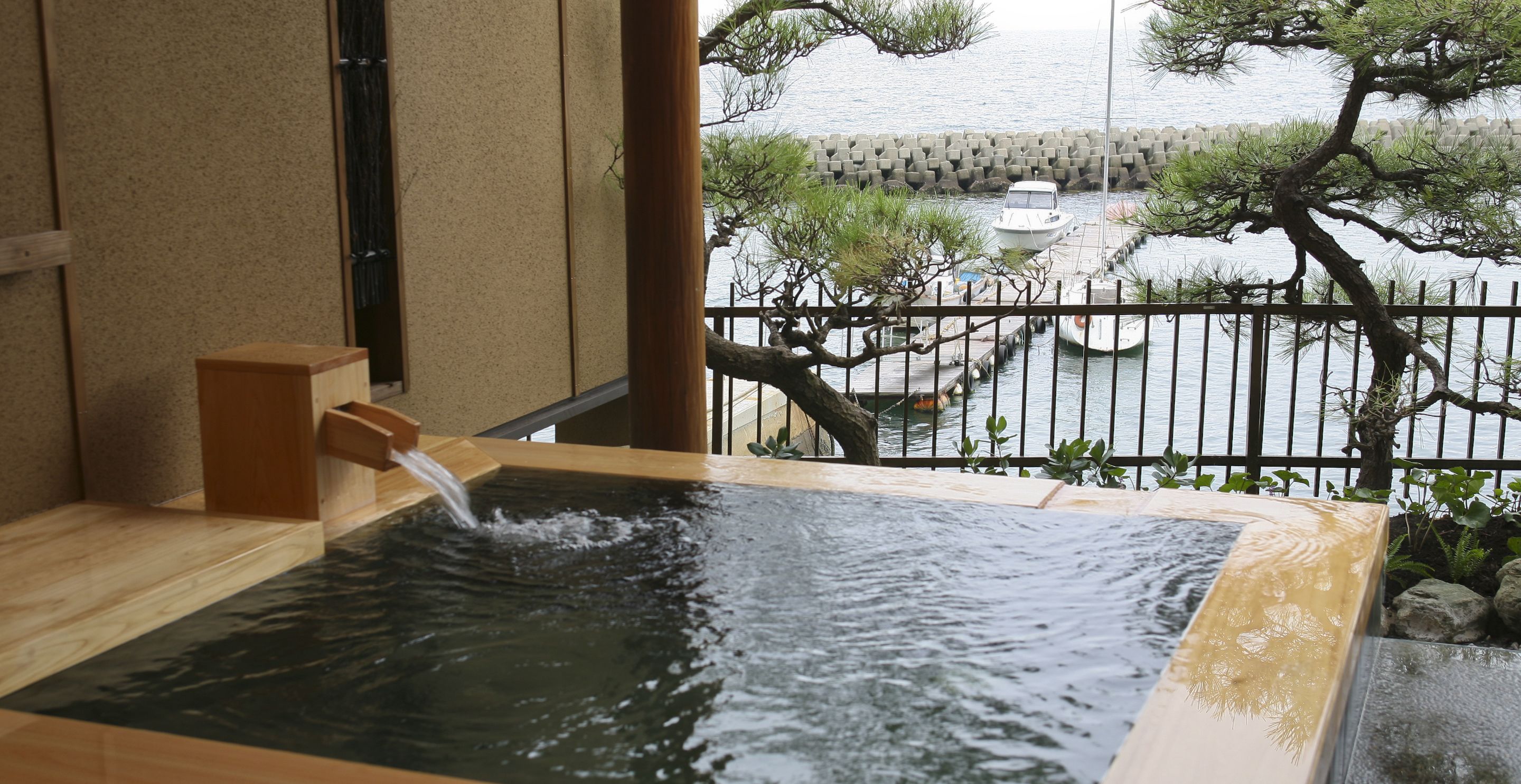 japanese style room with open-air onsen | bathroom | separate bathtub and shower, free toiletries, hair dryer, slippers