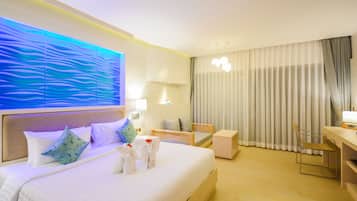 Deluxe Room, Garden View | Premium bedding, in-room safe, desk, soundproofing