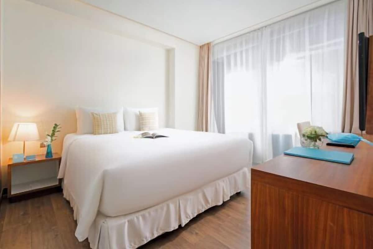 2 habitaciones, minibar y caja de seguridad en la habitación