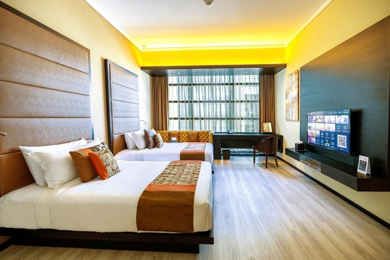 Premium bedding, down comforters, pillowtop beds, minibar