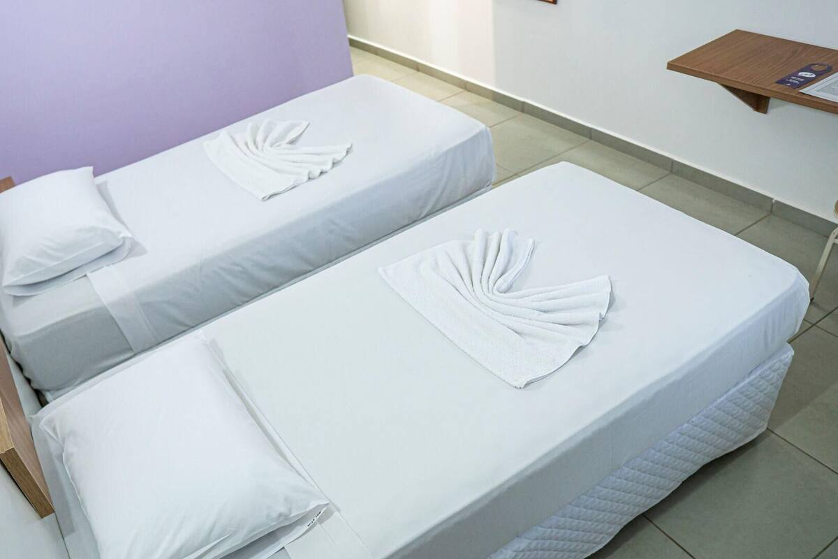 Frigobar, cortinas blackout, Wi-Fi de cortesia, roupa de cama