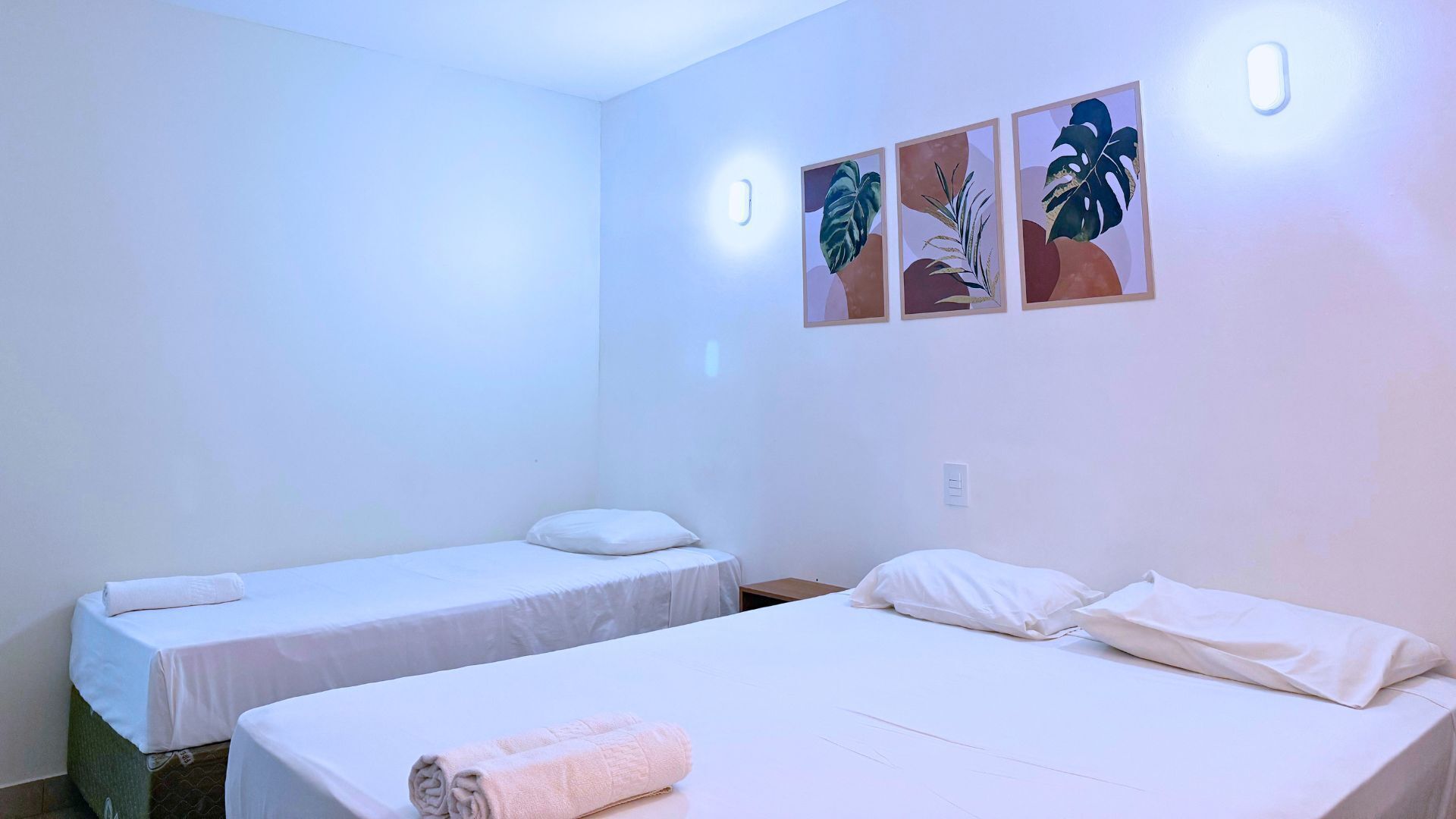 Triple Room | Minibar, blackout drapes, WiFi (free), bed sheets