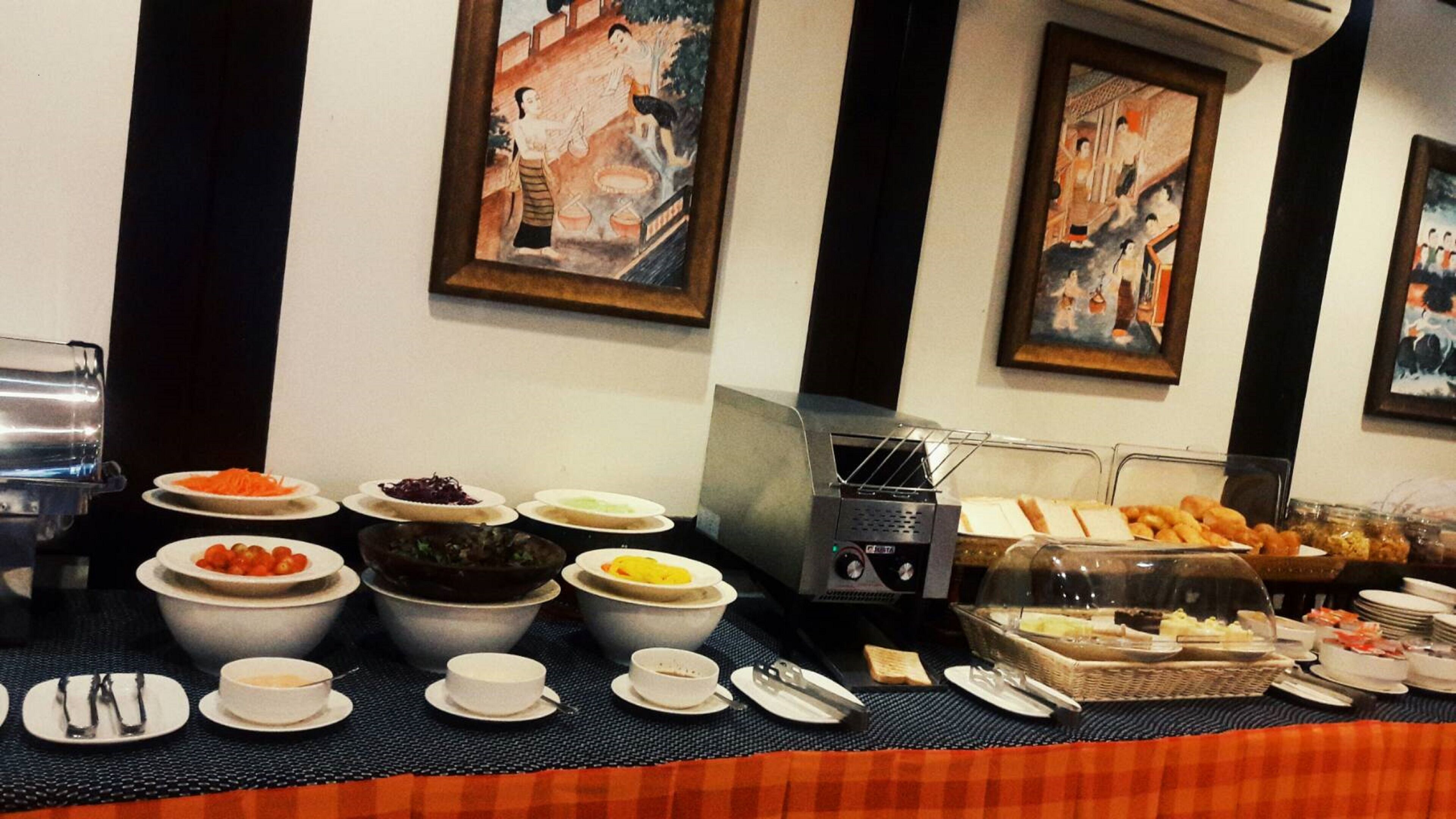 daily buffet breakfast (thb 250 per person)
