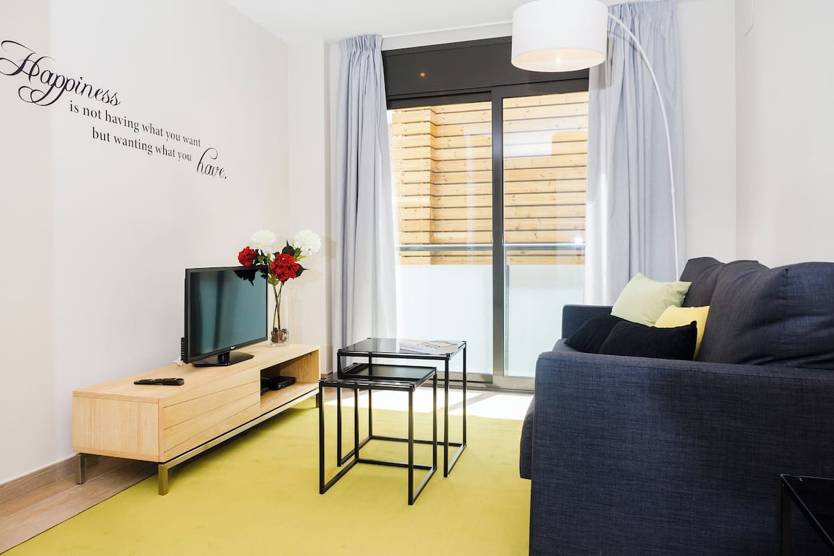 Apartment, 2 Bedrooms | Living area | Flat-screen TV, DVD player
