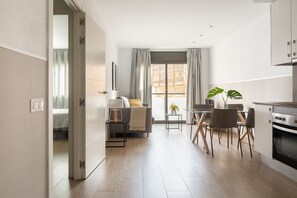 Apartment, 1 Bedroom | Living area | Flat-screen TV, DVD player - Feelathome Plaza Apartments (Barcelona)