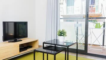 Superior Apartment, 2 Bedrooms | Living area | Flat-screen TV, DVD player