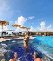 Outdoor pool, pool umbrellas, sun loungers