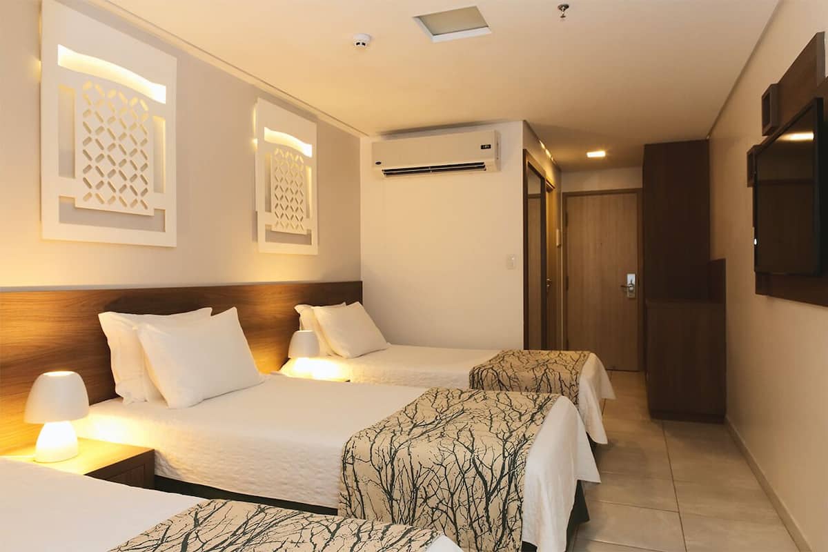 standard triple room | 2 bedrooms, minibar, in-room safe, individually decorated