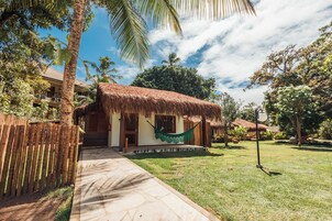 Bungalow, Partial Ocean View | Desk, laptop workspace, blackout drapes, free WiFi