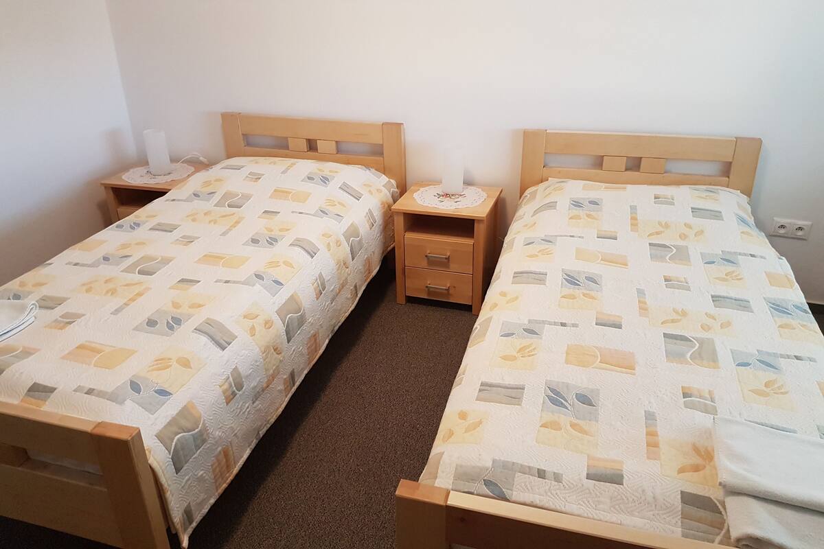 Desk, blackout curtains, soundproofing, rollaway beds