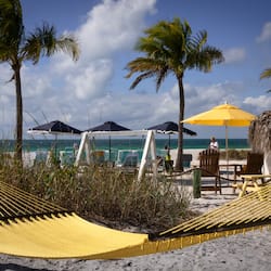 On the beach, surfing