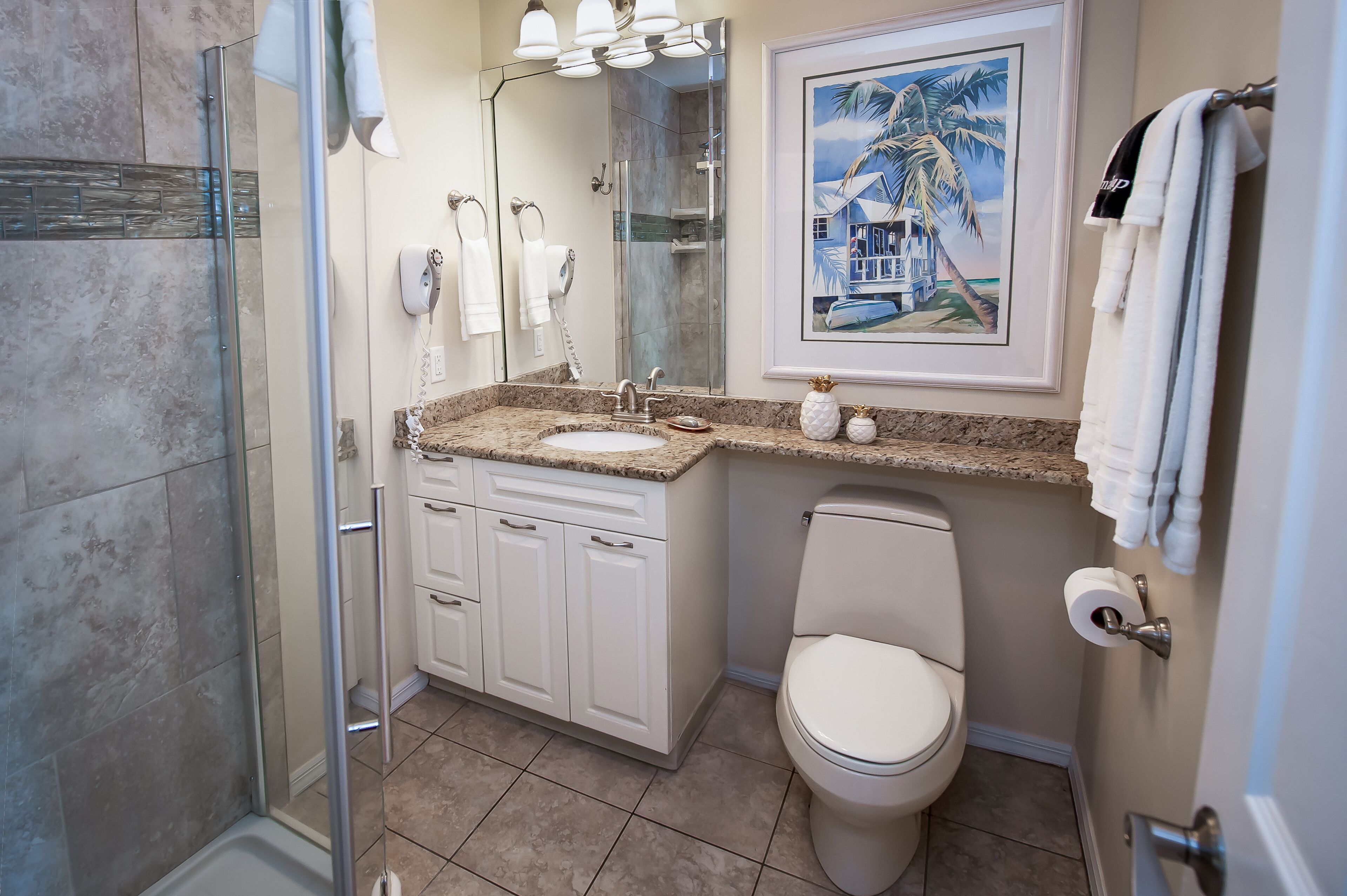 sand castle penthouse | bathroom | designer toiletries, hair dryer, towels, soap