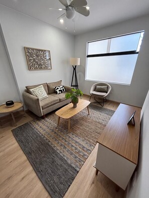 Appartement Premium, 1 très grand lit | Coin séjour
