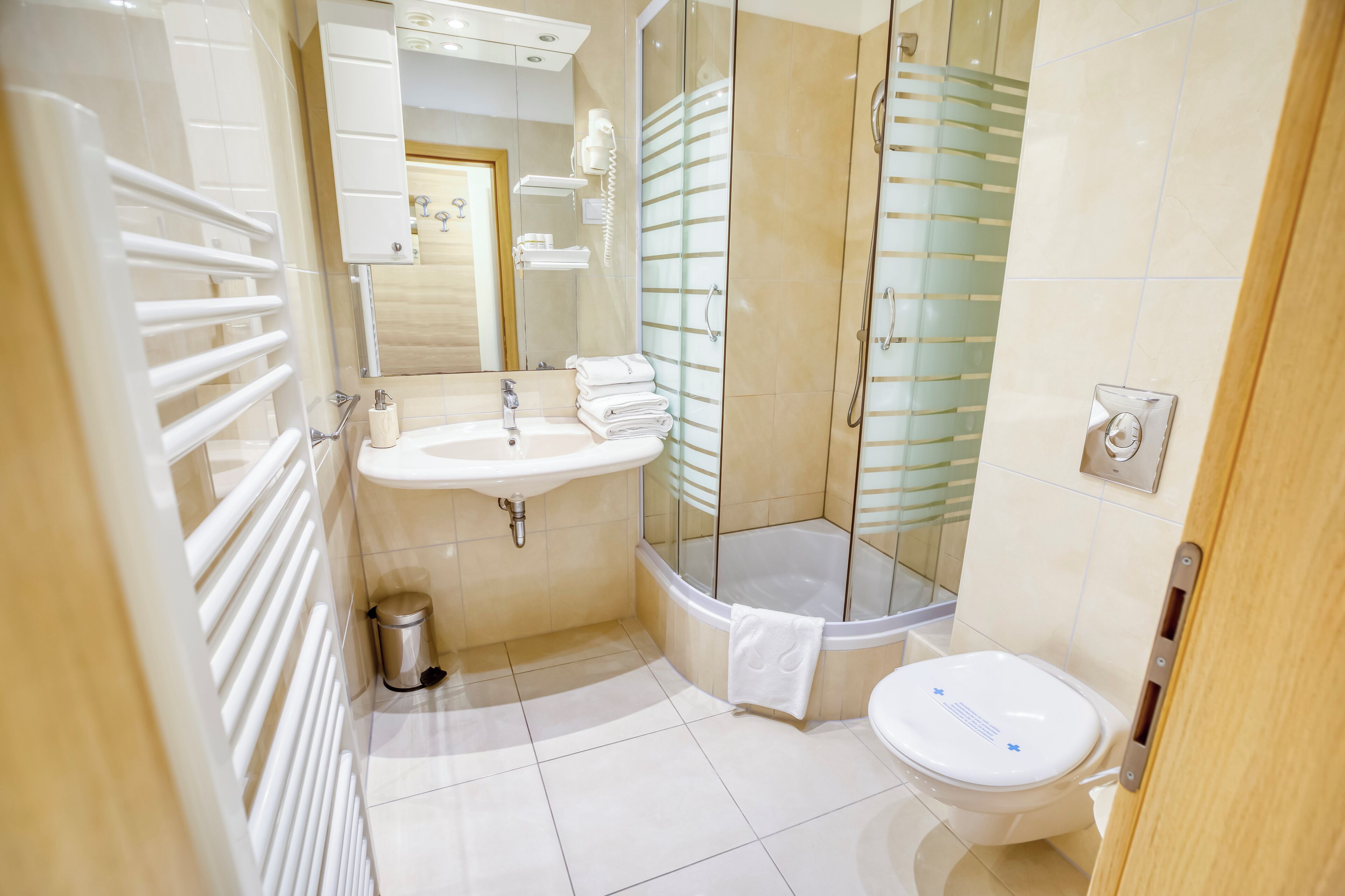 superior triple room | bathroom | shower, rainfall showerhead, free toiletries, hair dryer