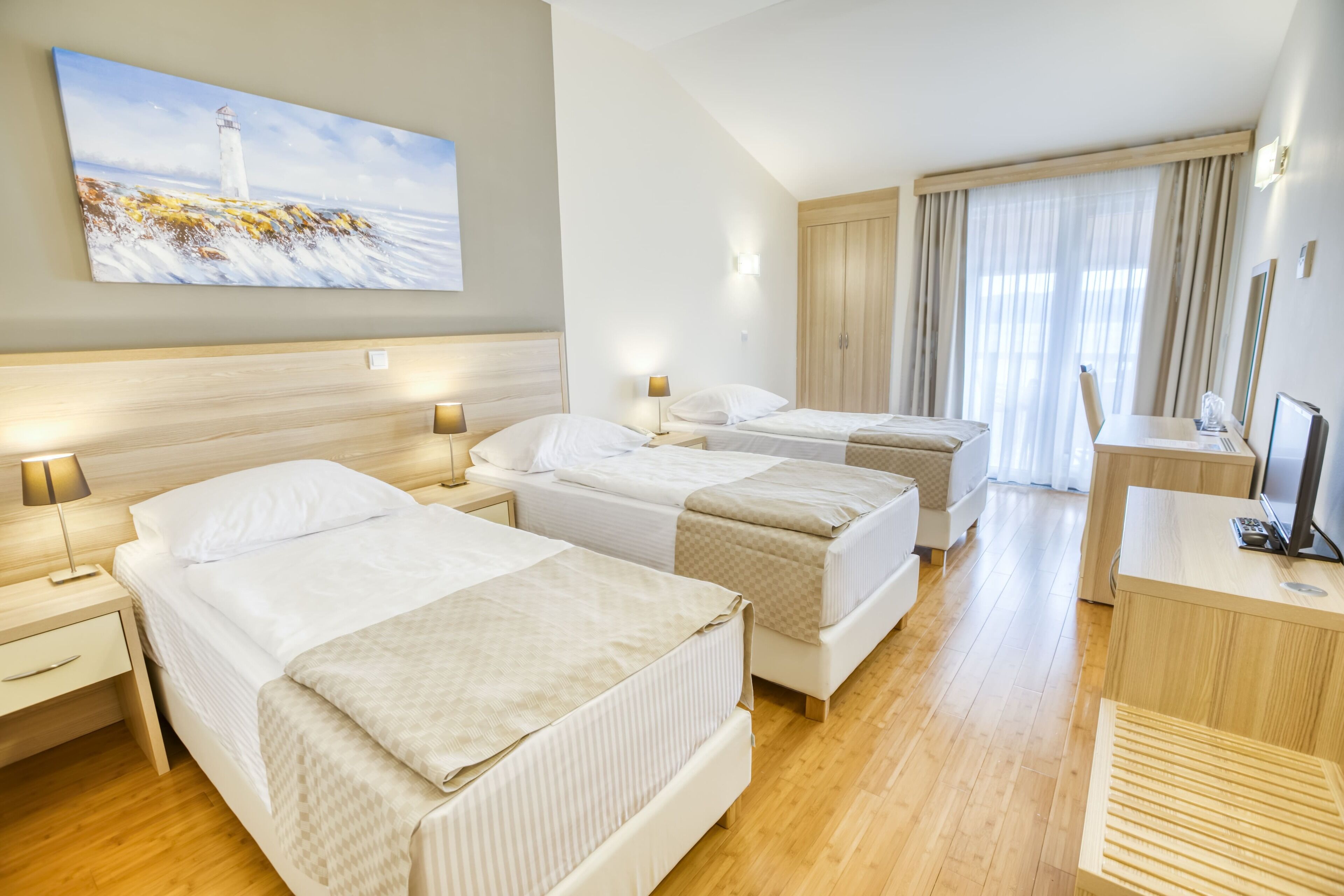 superior triple room | 1 bedroom, in-room safe, desk, laptop workspace