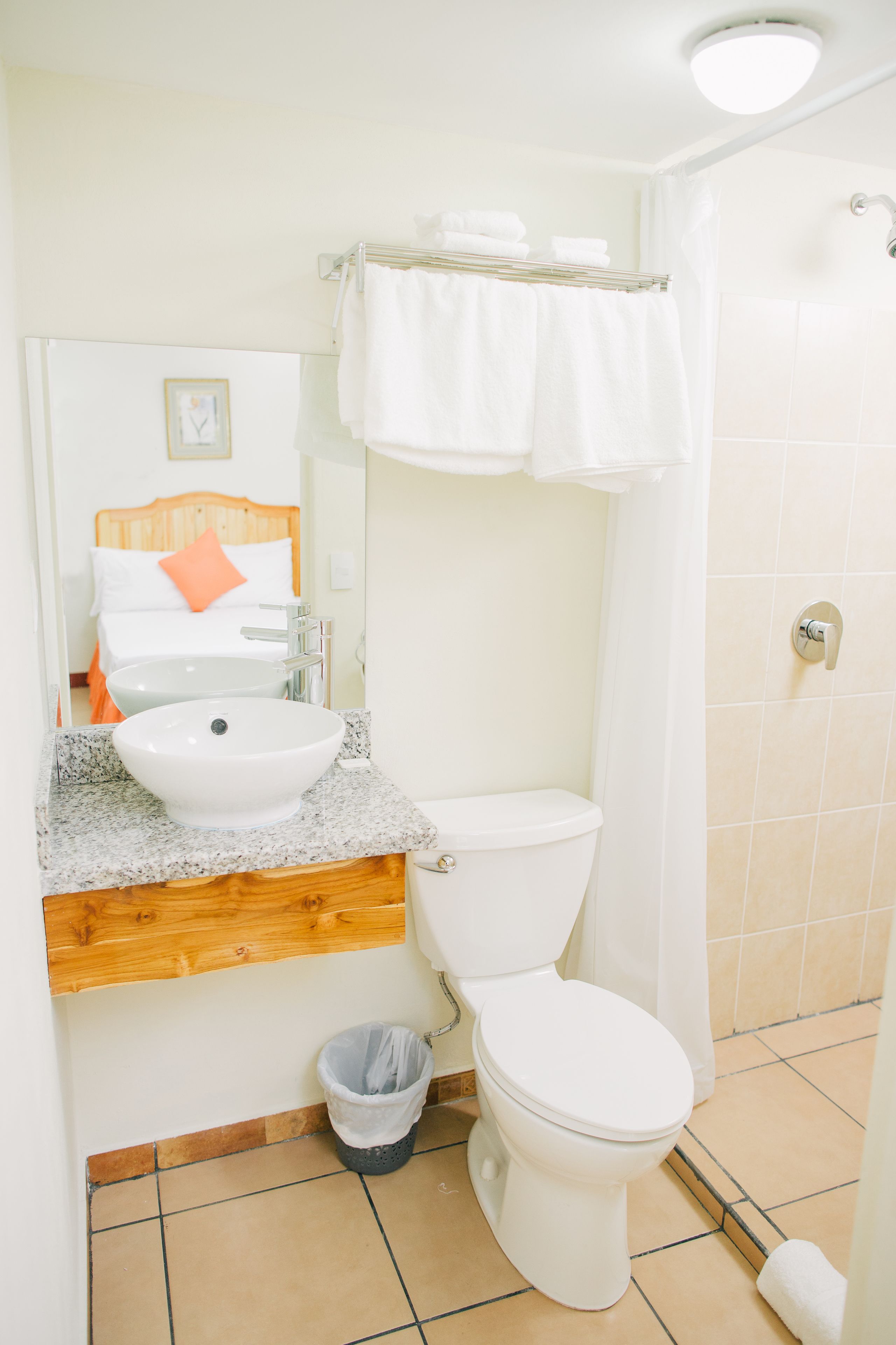 standard single room | bathroom | shower, designer toiletries, towels