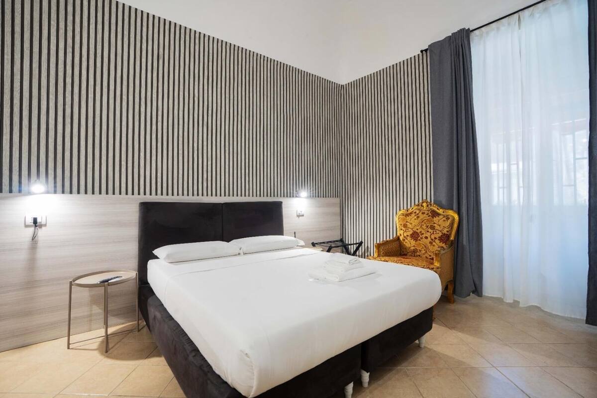Comfort Quadruple Room | Desk, blackout drapes, soundproofing, iron/ironing board (on request)
