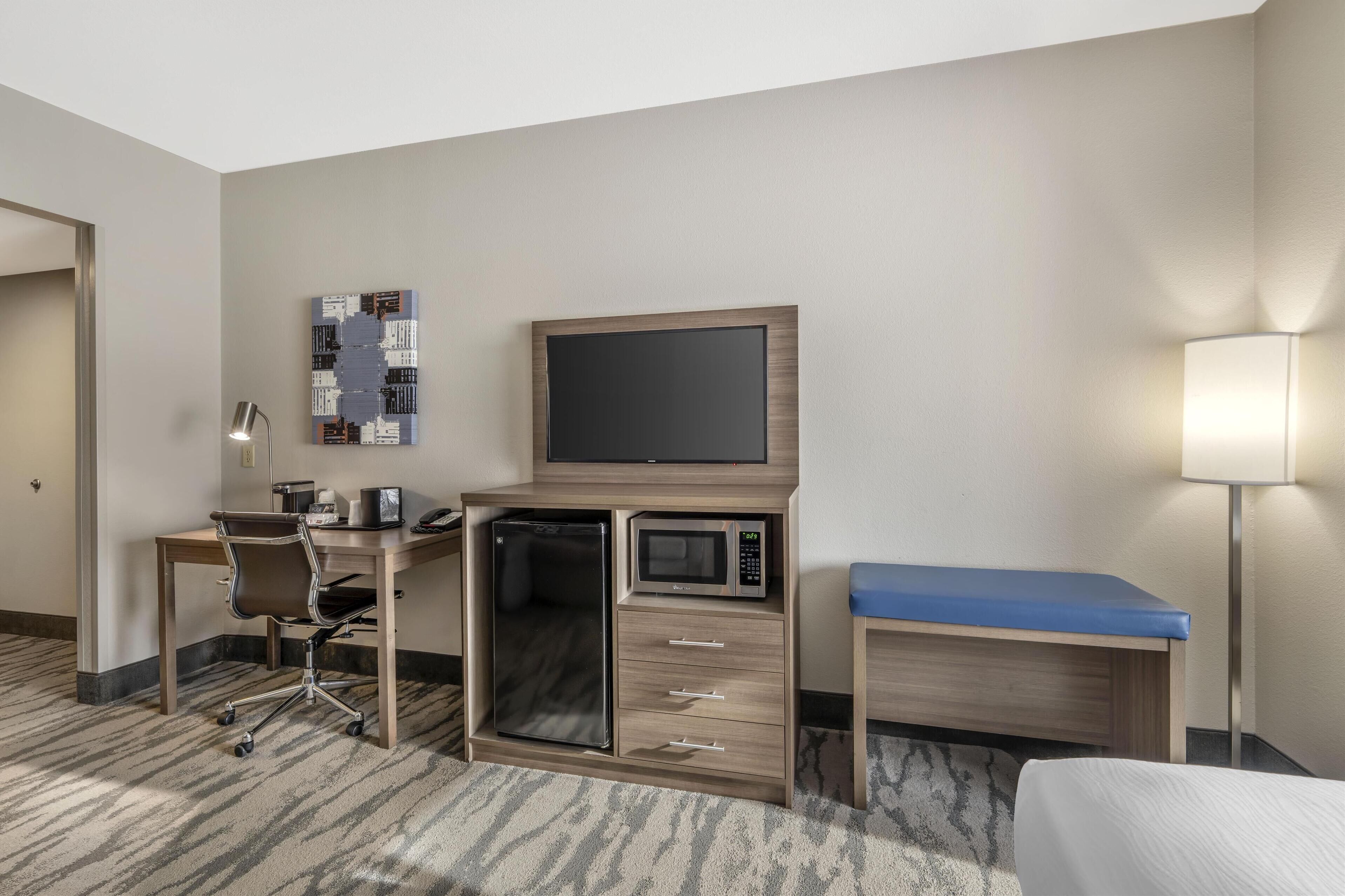 suite, 1 king bed, non smoking, refrigerator & microwave | in-room safe, desk, laptop workspace, iron/ironing board