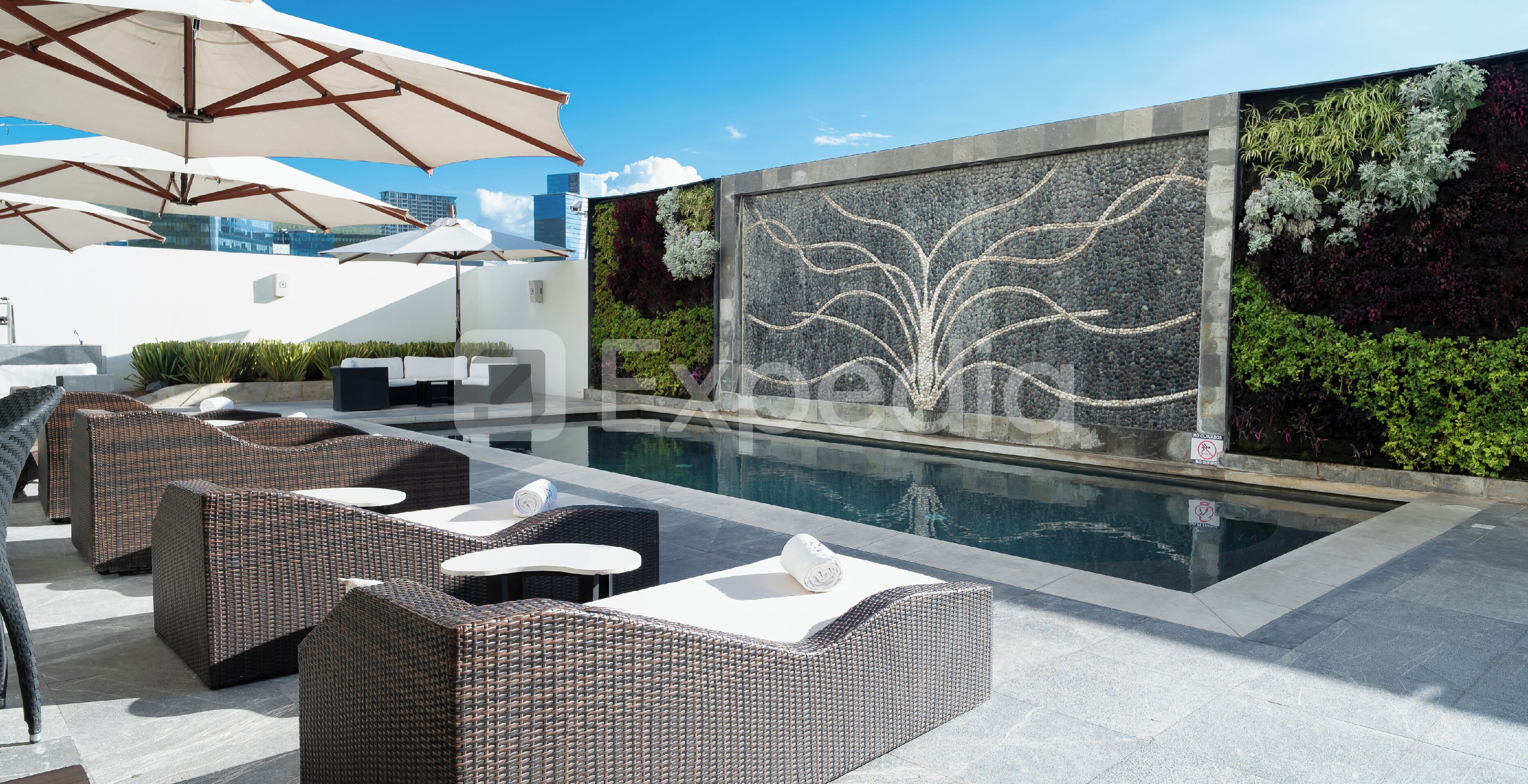 Outdoor pool, open 8:00 AM to 10:00 PM, pool umbrellas, sun loungers