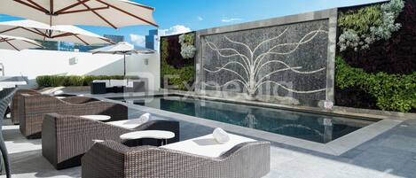 Outdoor pool, open 8:00 AM to 10:00 PM, pool umbrellas, sun loungers