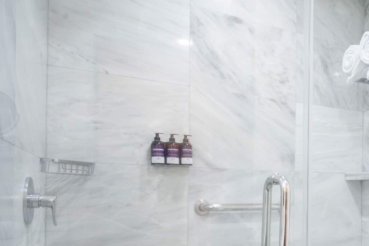 shower, rainfall showerhead, designer toiletries, hair dryer