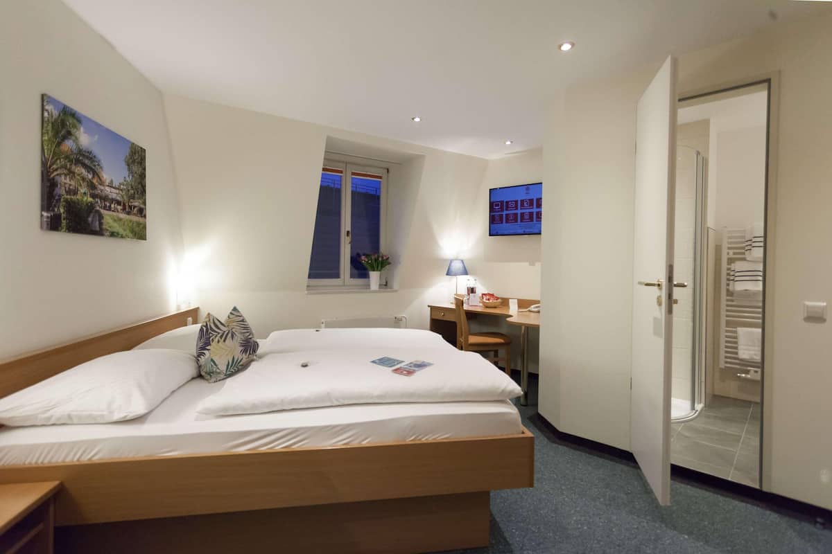 Desk, blackout drapes, WiFi (free), bed sheets