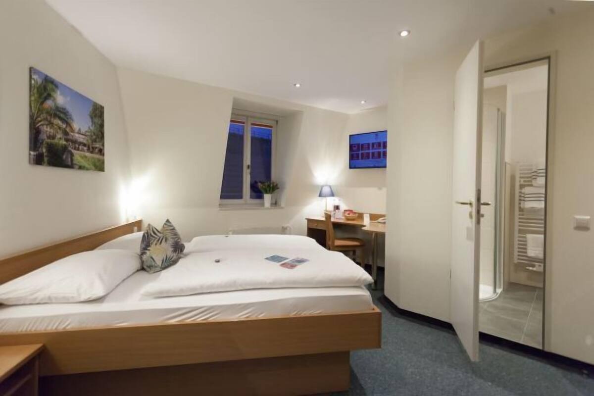 Desk, blackout curtains, free WiFi, bed sheets