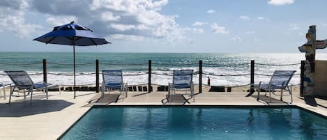 Outdoor pool, pool umbrellas, pool loungers