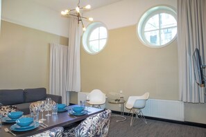 Deluxe apartment (4 persons) | Zona de estar | Una televisión de pantalla plana