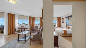 Suite, 1 King Bed, Pool View (Suite Pool View) | Pillowtop beds, minibar, in-room safe, blackout drapes
