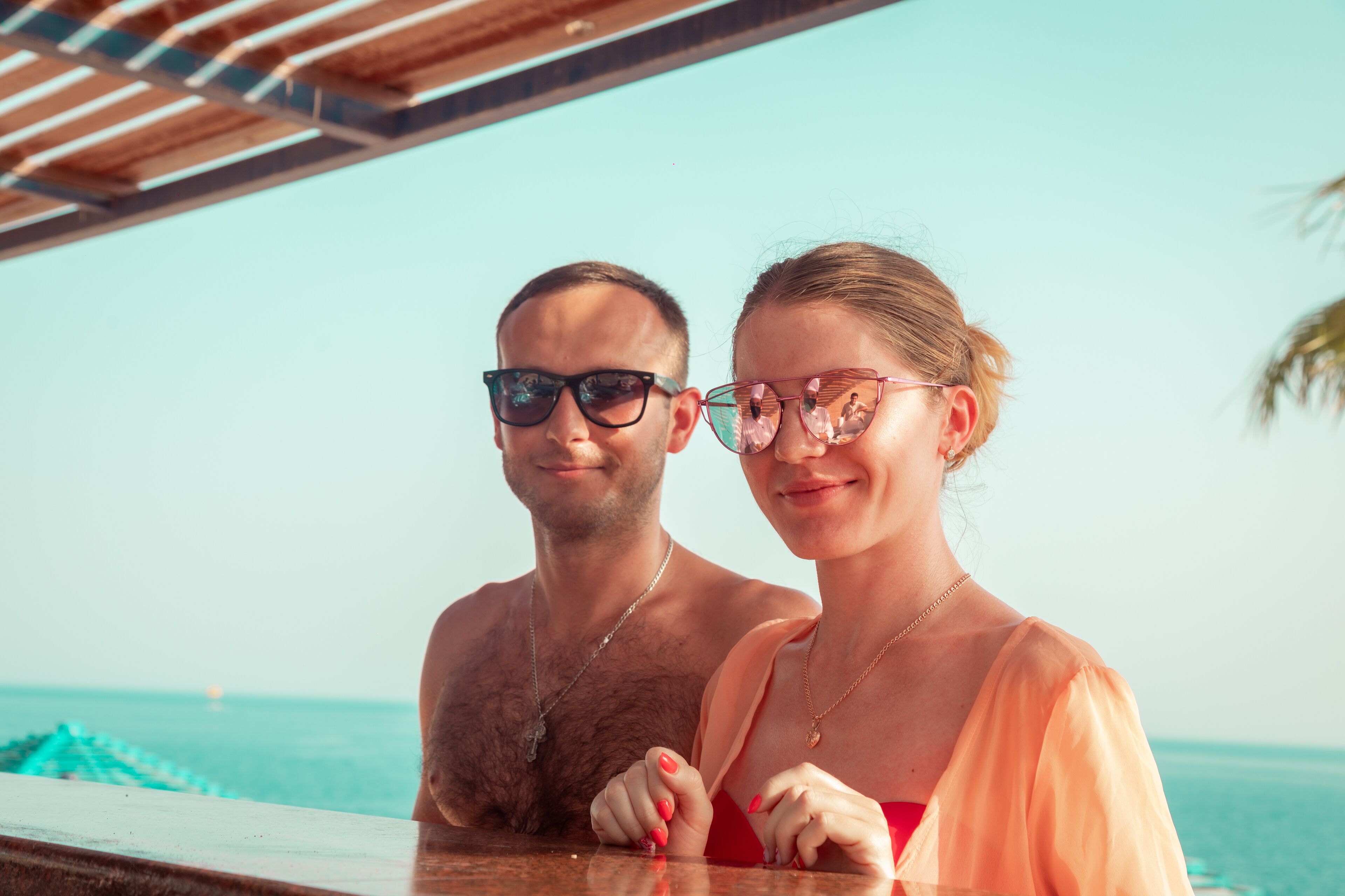 on the beach, sun-loungers, beach umbrellas, beach towels