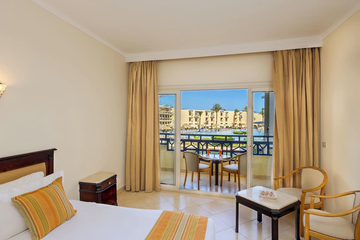 Standard Room, Multiple Beds, Pool View (Standard Pool View) | Pillowtop beds, minibar, in-room safe, blackout drapes