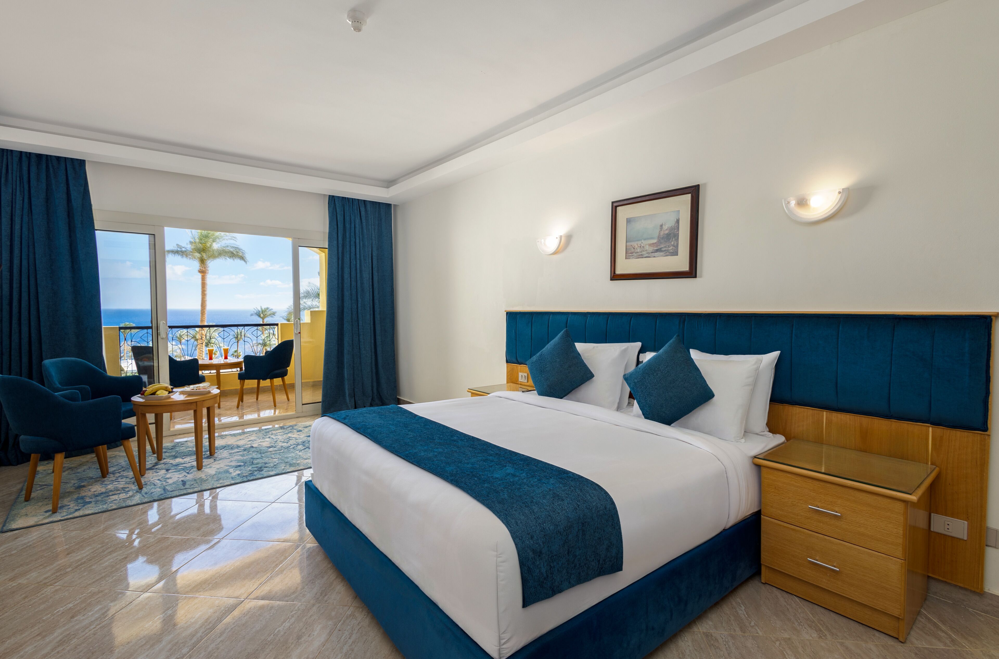 Deluxe Room, 1 Double Bed, Sea View | Pillowtop beds, minibar, in-room safe, blackout drapes