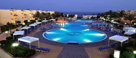 2 outdoor pools, open 8:00 AM to 5:30 PM, free cabanas, pool umbrellas