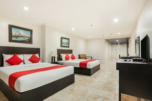 Suite Family Room | 1 bedroom, in-room safe, free WiFi, bed sheets