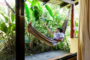 Standard Quadruple Room | Terrace/patio - Catarata Eco-Lodge (La Fortuna)